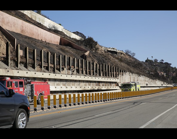A burned retaining wall in front of the Getty Villa is shown on PCH in January 2025.