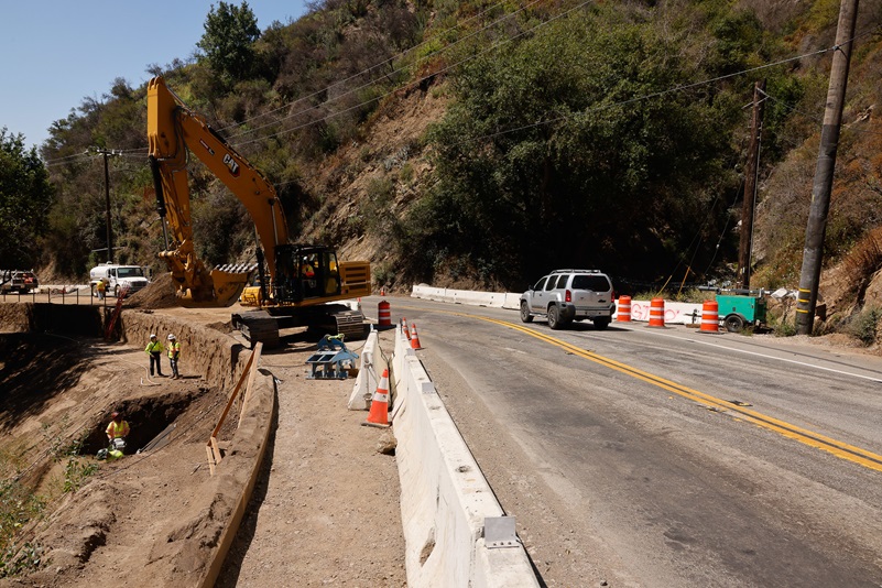 Crews work in the Palisades Fire Recovery work zone in June 2026 on Topanga Canyon Boulevard/State Route 27 in Topanga.