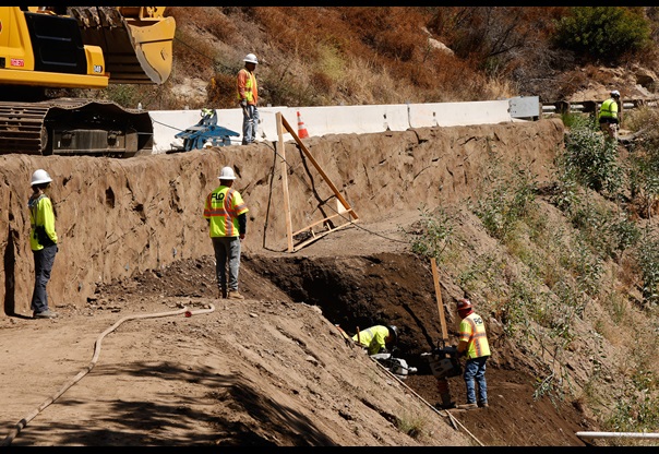 Crews work in the Palisades Fire Recovery work zone in June 2026 on Topanga Canyon Boulevard/State Route 27 in Topanga.