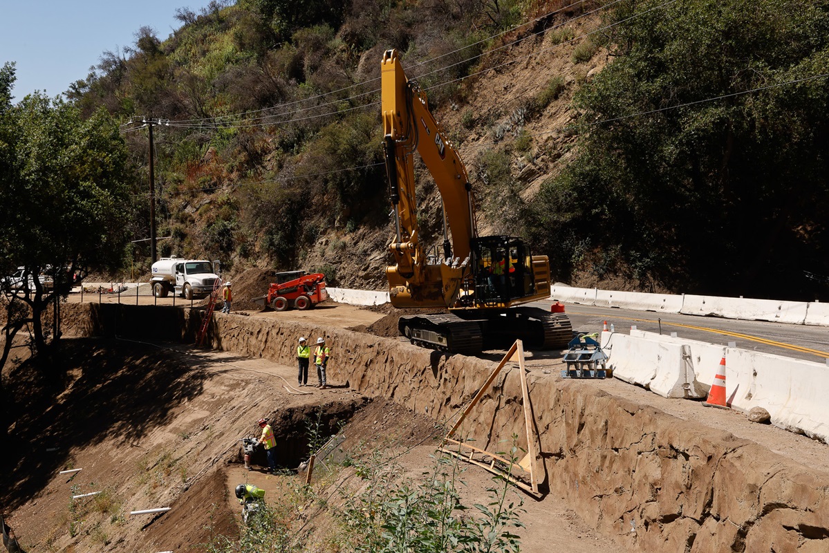 Crews work in the Palisades Fire Recovery work zone in June 2026 on Topanga Canyon Boulevard/State Route 27 in Topanga.