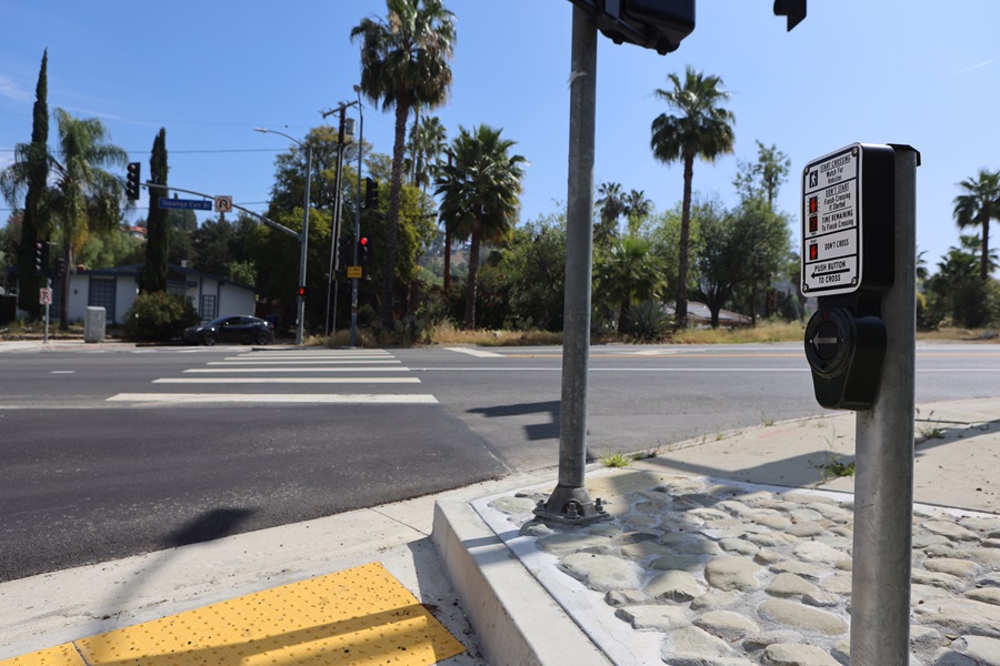 New pedestrian push buttons are shown at an intersection on State Route 27 in the San Fernando Valley.