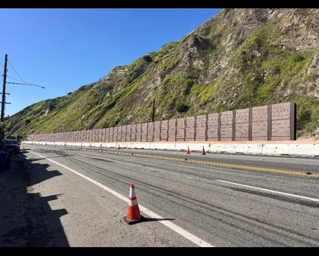 The completed catchment wall is shown in February 2026. It was damaged in the 2025 Palisades Fire.