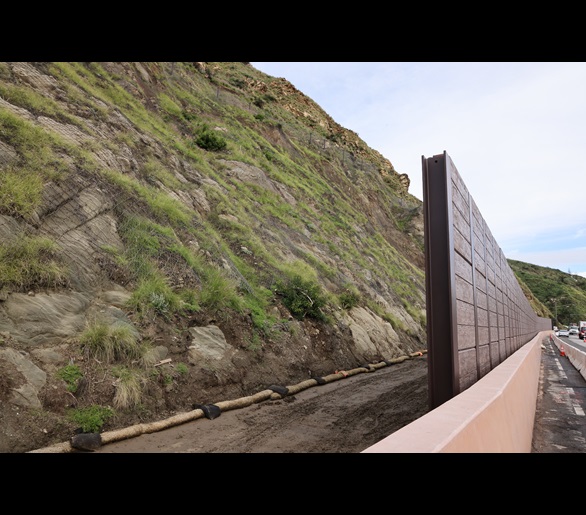 A restored catchment wall is shown in January 2026 on PCH.