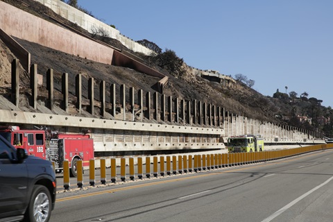 A burned retaining wall in front of the Getty Villa is shown on PCH in January 2025.