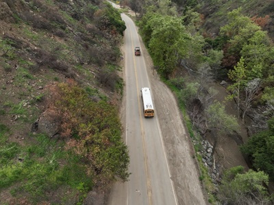 Overhead photo of school bus traveling along SR-27