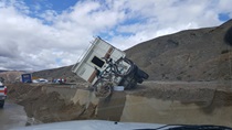 A camper trailer stuck in the mud on State Route 58 on October 16, 2015.