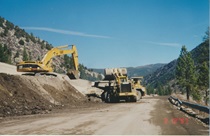 Construction crews work to repair and reopen U.S. 395 through Walker Canyon following historic flooding in 1997.