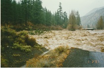 Raging flood waters wash through an area where U.S. 395 once stood on January 2, 1997.