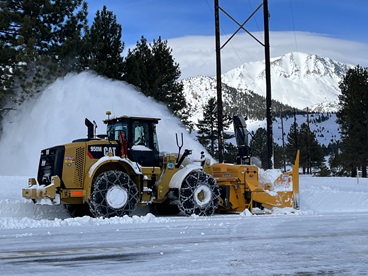 A snow blower removing snow from U.S. 395 in Mono County.