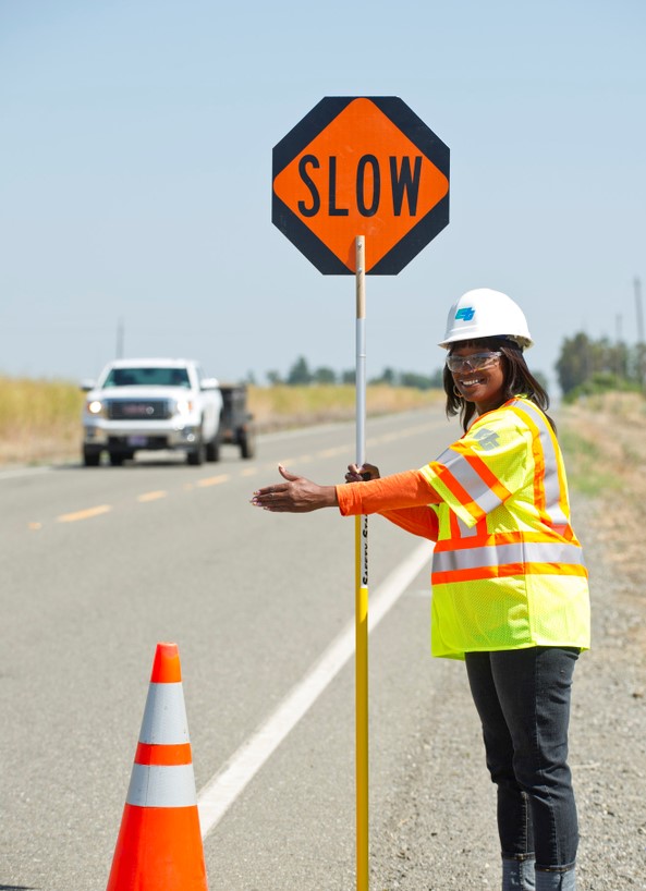 Flagging operator allowing traffic to proceed