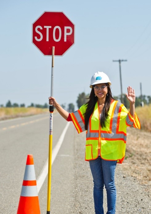 Flagger Road Sign