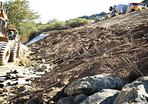 Soil filled rock slope protection