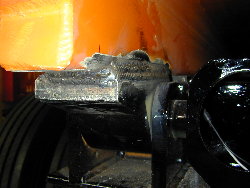 Photograph of desired installation method of a body sill to hinge blocks.