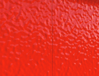 Orange peel can be seen on a high gloss surface as a wavy pattern of light and dark areas.