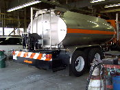 This image shows the side of a Caltrans tanker from an oblique angle.