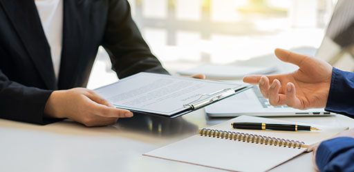 Image of two people collaborating
