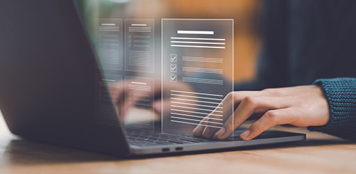 Image of someone using a laptop