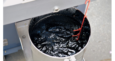 foamed asphalt in a laboratory being tested for foaming properties 