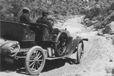 Automobile travelers on a California road in May 1910.