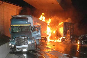 Interstate 5 near Santa Clarita - massive pileup and fire closed freeway tunnel in both directions, killing three and destroying 31 vehicles.