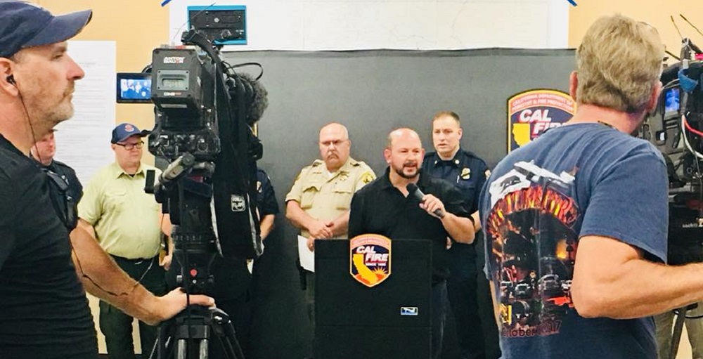 Caltrans District 2 Director Dave Moore participates in a CalFire press conference during the 2018 Carr Fire. 