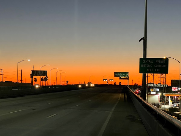 The first cars cross the I-10 freeway upon re-opening after a major fire, 7:00pm November, 19, 2023.