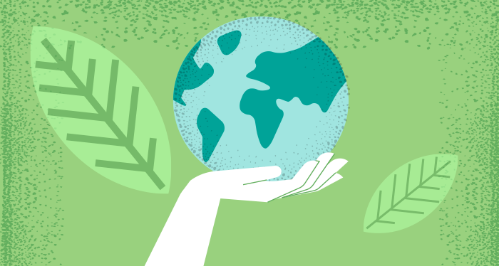 Illustration of earth being held by hand