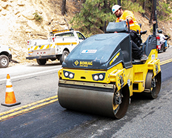 Thumbnail image of Caltrans worker paving a highway.