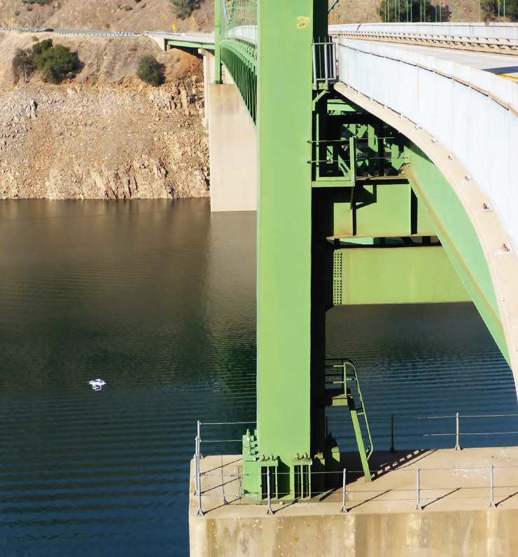 Photo of a drone hovering next to the Bidwall Bar Bridge on highway 162.