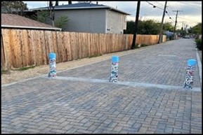 the same alley with major safety improvements, fencing and shade trees