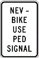 NEV bike use ped signal sign