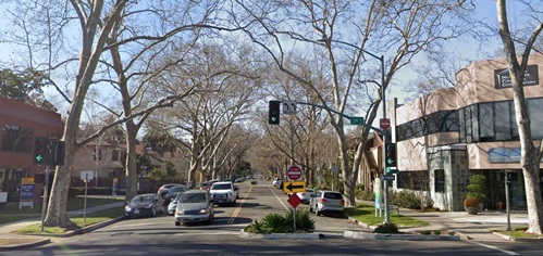 Image of a typical partial closure implementation at an intersection that improves safety by reducing intersection conflict points and cut-through traffic with a planter