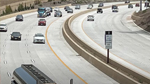 Freeway with a high-occupancy vehicle (HOV - aka "carpool") lane and free-flowing traffic